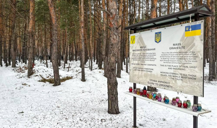 Место массового захоронения Изюм в Харьковской области. Фото: Харьковская облпрокуратура